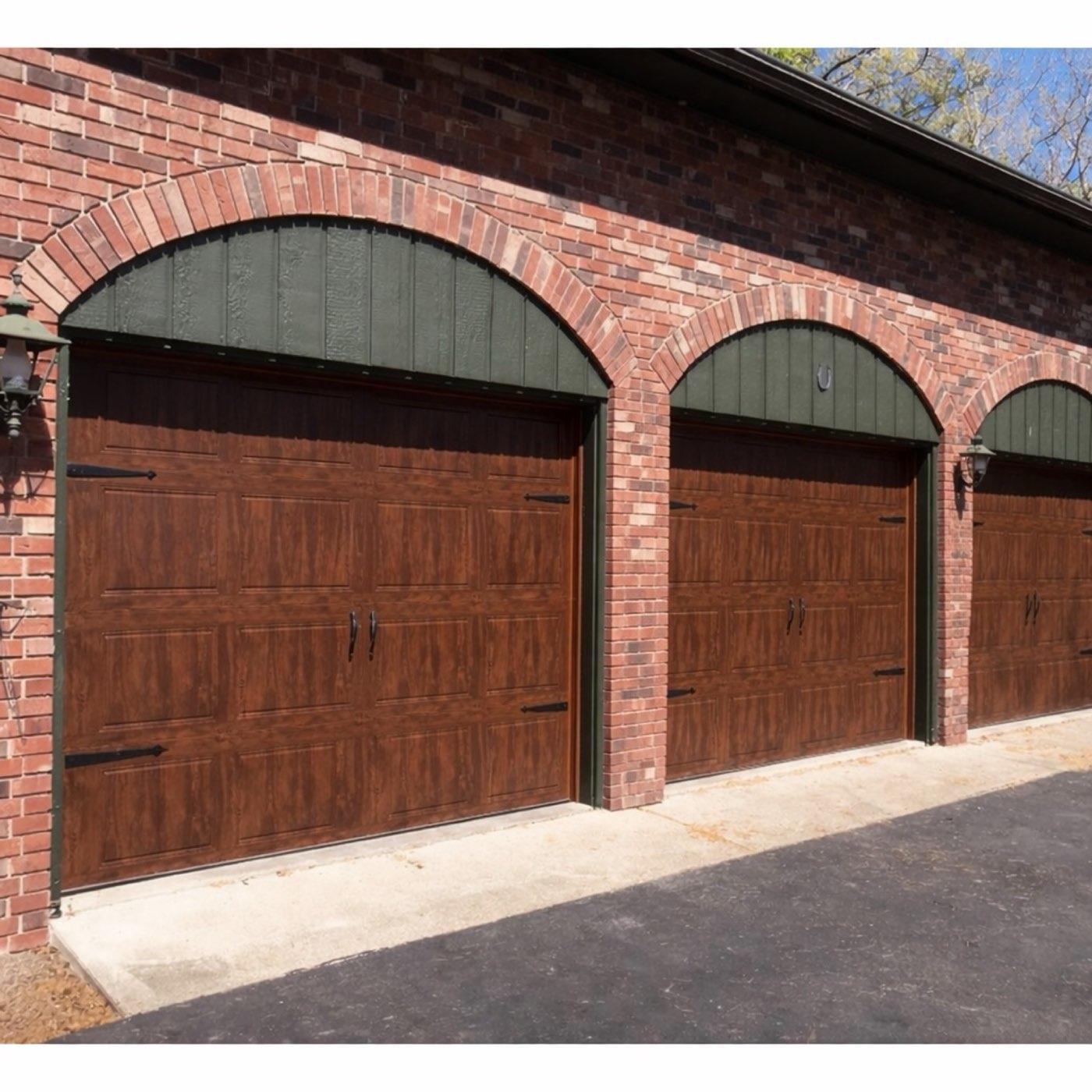 Professional garage door repair and installation service in Glen Allen, VA - technician servicing a residential garage door
